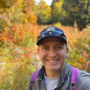 1697889627465 Author, Brandon Jenkins, with fall foliage in the background. Helping you not feel stuck.