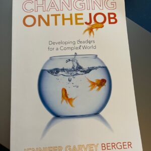 1697976002920 Photo of book titled "Changing on the Job"