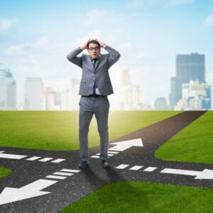 1704200414977 Confused leader standing at a crossroads. Effective leadership.