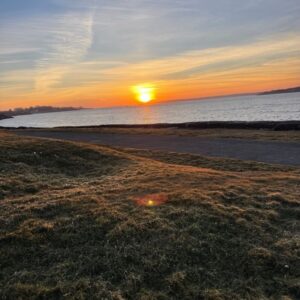 1708347693711 Photo of sunset over water by author, Brandon Jenkins. Resilience.