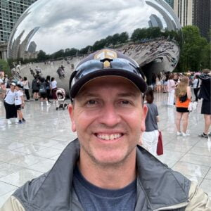 1720958102062 Author, Brandon Jenkins, stands in front of the Bean (Cloud Gate) sculpture. He writes about dreams are a good start.