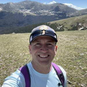 1724016072410 Author, Brandon Jenkins, pictured hiking in a mountain range. He writes about don't stop at reflection.