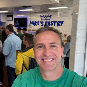 1727559842879 Author and Coach, Brandon Jenkins, inside Mike's Pastry in Boston. He writes about being a people pleaser.