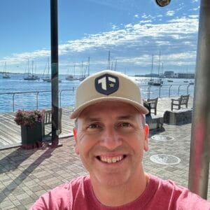1728085258512 Author and Coach, Brandon Jenkins, pictured on a sunny day in front of the water. He writes about avoiding the trap of not asking for help.