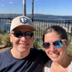1729304927383 Author, Brandon Jenkins, pictured with his wife. He writes about raise yourself, raise your team.