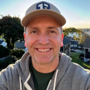 1730247839202 Author Brandon Jenkins pictured in a sweatshirt and hat on a sunny day. He writes about leadership platitudes.