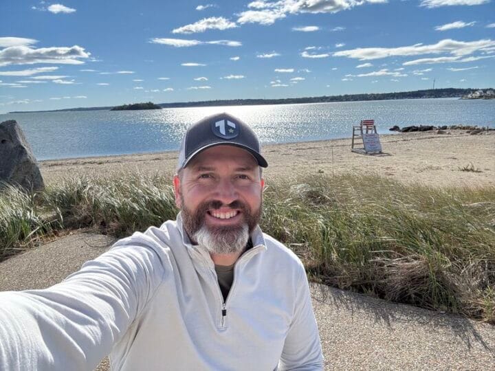 Author and coach Brandon Jenkins writes about go mode and recharging. He is pictured on a sunny day at the beach.