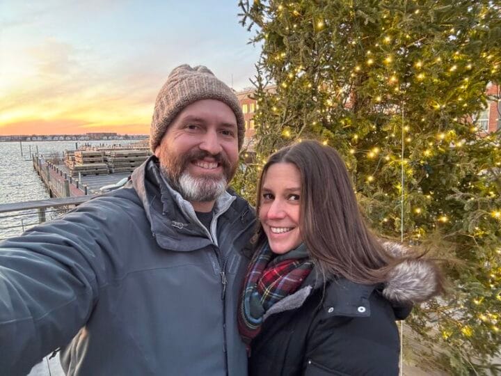 Coach Brandon Jenkins writes about human connection. He is pictured with his wife, Julie, outside at sunset.