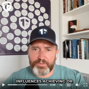 Coach Brandon Jenkins is pictured in his office, discussing noticing and testing your assumptions.