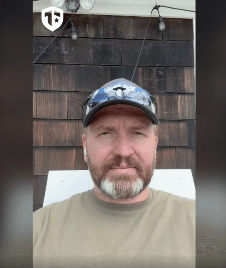 Coach Brandon Jenkins writes about the old arena. He is pictured outside, wearing a hat. 