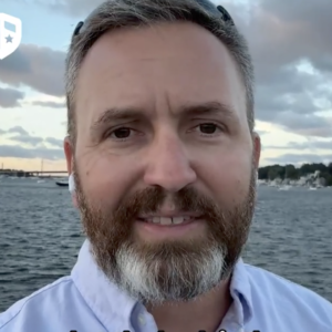 Coach Brandon Jenkins chats about escaping the golden path fallacy. He's pictured walking by the water.