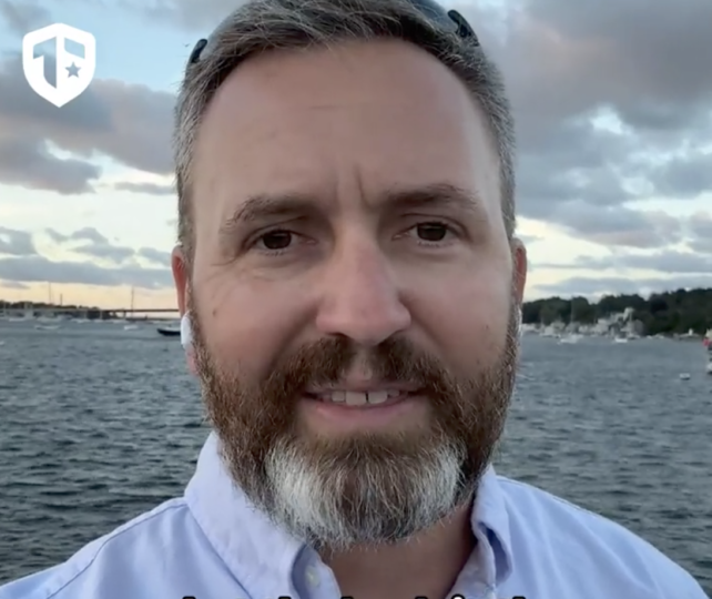 Coach Brandon Jenkins chats about escaping the golden path fallacy. He's pictured walking by the water.