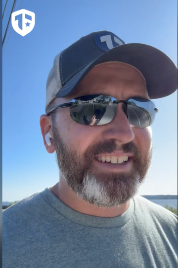 Coach Brandon Jenkins chats about moving up a level. He is pictured on a walk outside.