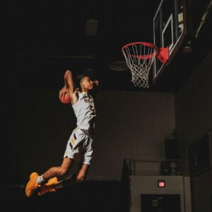 august-phlieger-CREqtqgBFcU-unsplash Basketball player practicing alone. Author Brandon Jenkins writes about staying resilient.