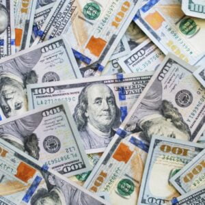 100 Dollar Bills spread out - rich - wealthy