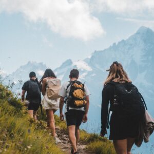 justin-buisson-vIluu0IH6Ps-unsplash-2 Leader with hiking group