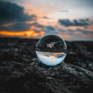 louis-maniquet-71QXQUSC_Do-unsplash Image of a marble reflecting light on a sandy area. Author, Brandon Jenkins, writes about how the world needs you.