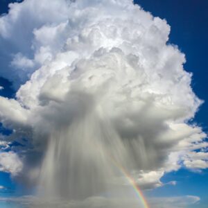 noaa-UJsUJr3cgEM-unsplash Weathering storm to happier weather with a rainbow.