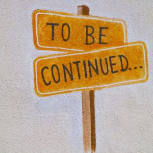 reuben-juarez-C4sxVxcXEQg-unsplash Author and Coach, Brandon Jenkins, writes about the stories we tell ourselves and how they can hold us back. Image shows a road sign with To Be Continued...