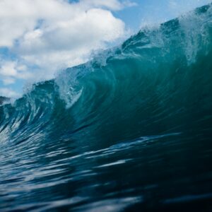 tim-marshall-EZSlp_sVXzM-unsplash Author Brandon Jenkins writes about inertia. Pictured is the inertia of an ocean wave.